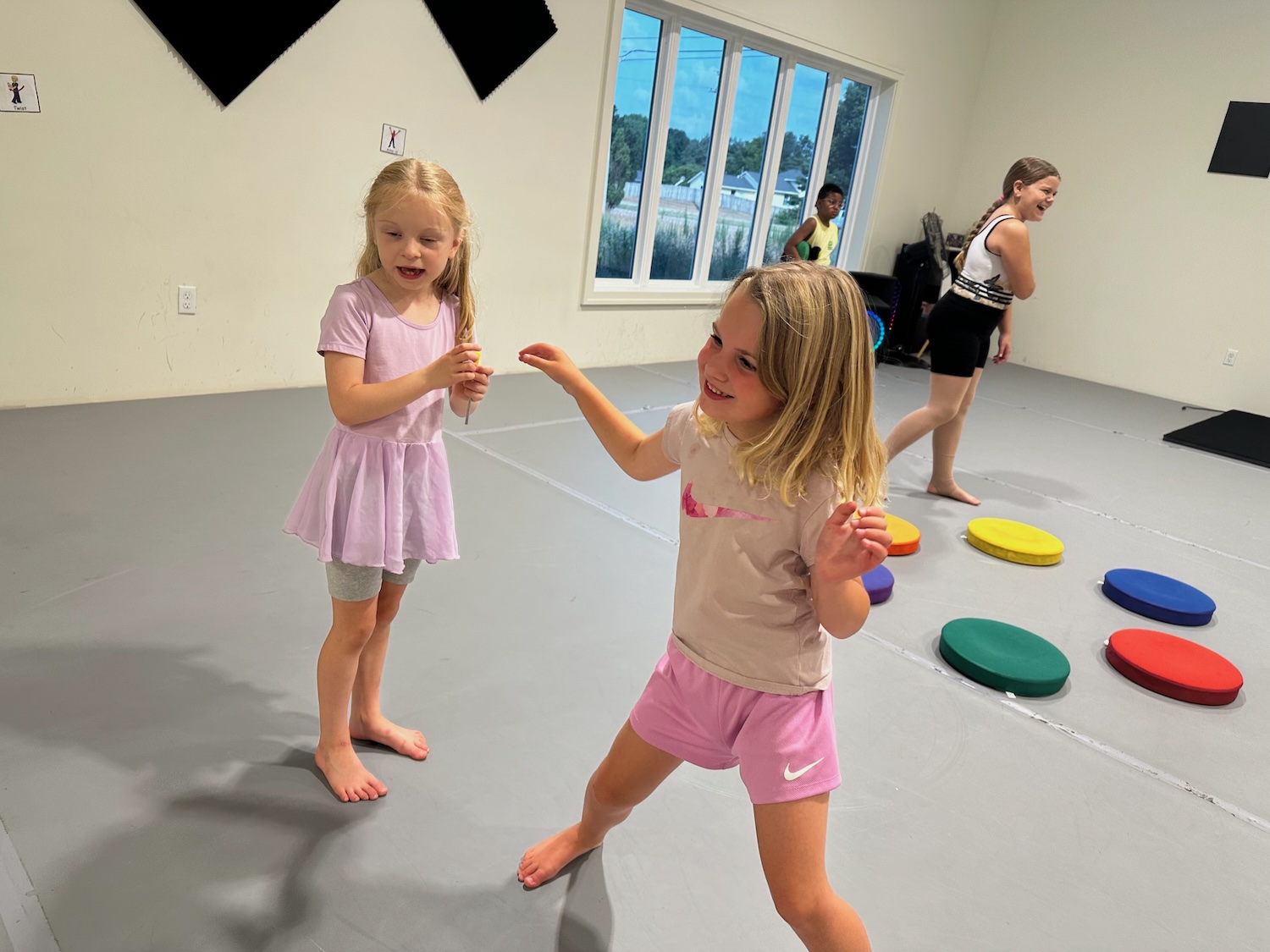 students having cookies in dance class